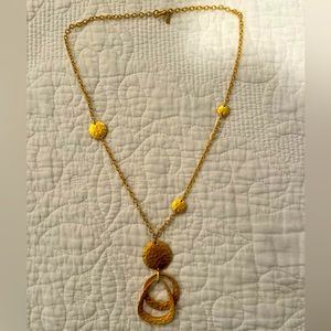 Premier Designs bright matte gold pendant necklace.